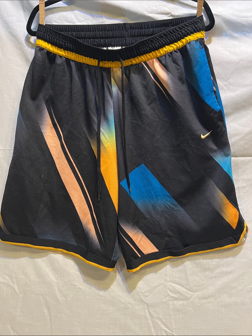 Nike Black Athletic Shorts with Blue and Yellow Accents